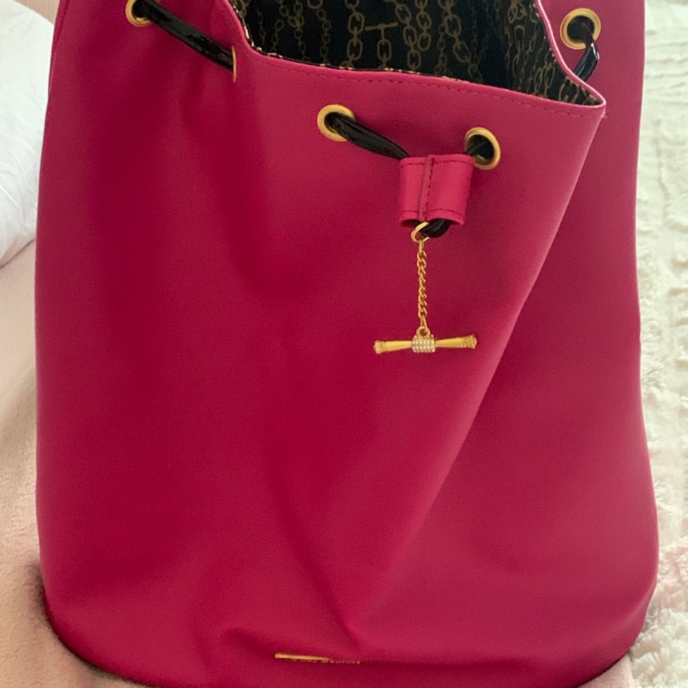 Juicy Couture vinyl back pack. New. Pink and Black